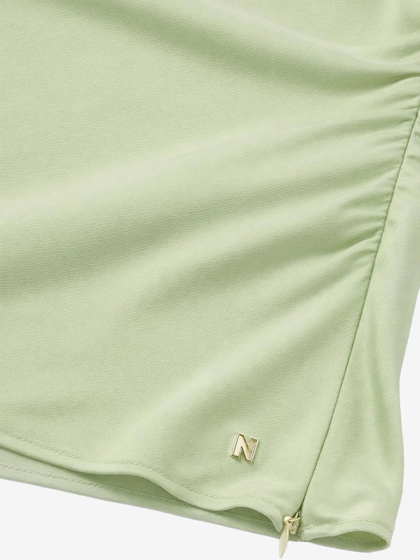 Haut en satin avec détails en arc PROVO - Aloe vera